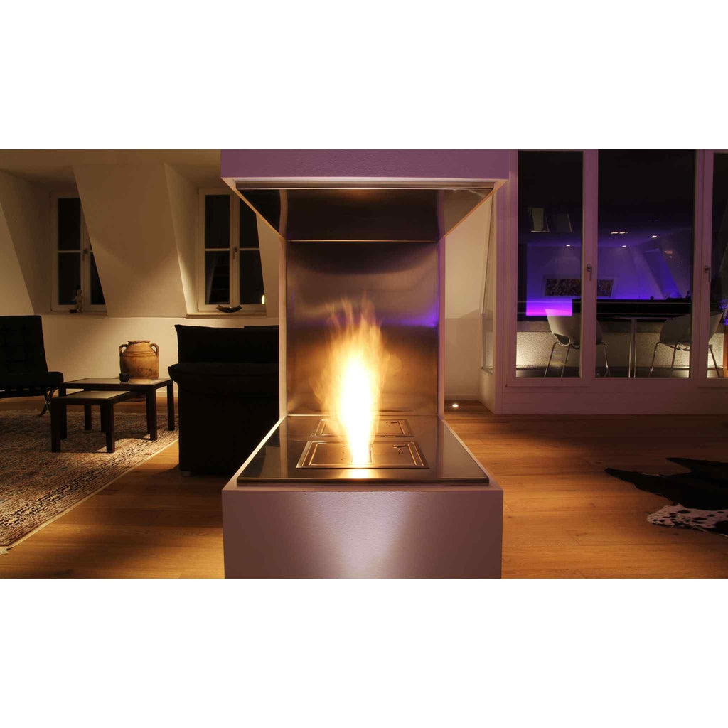 EcoSmart Fire BK5 ethanol burner with a bright flame set in a modern stainless steel fireplace in a living room.