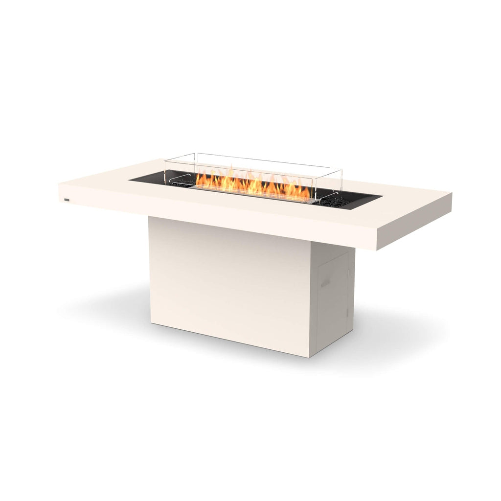 EcoSmart Fire Gin 90 bar table with a cream finish, central linear burner, glass screen, and flickering orange flames.
