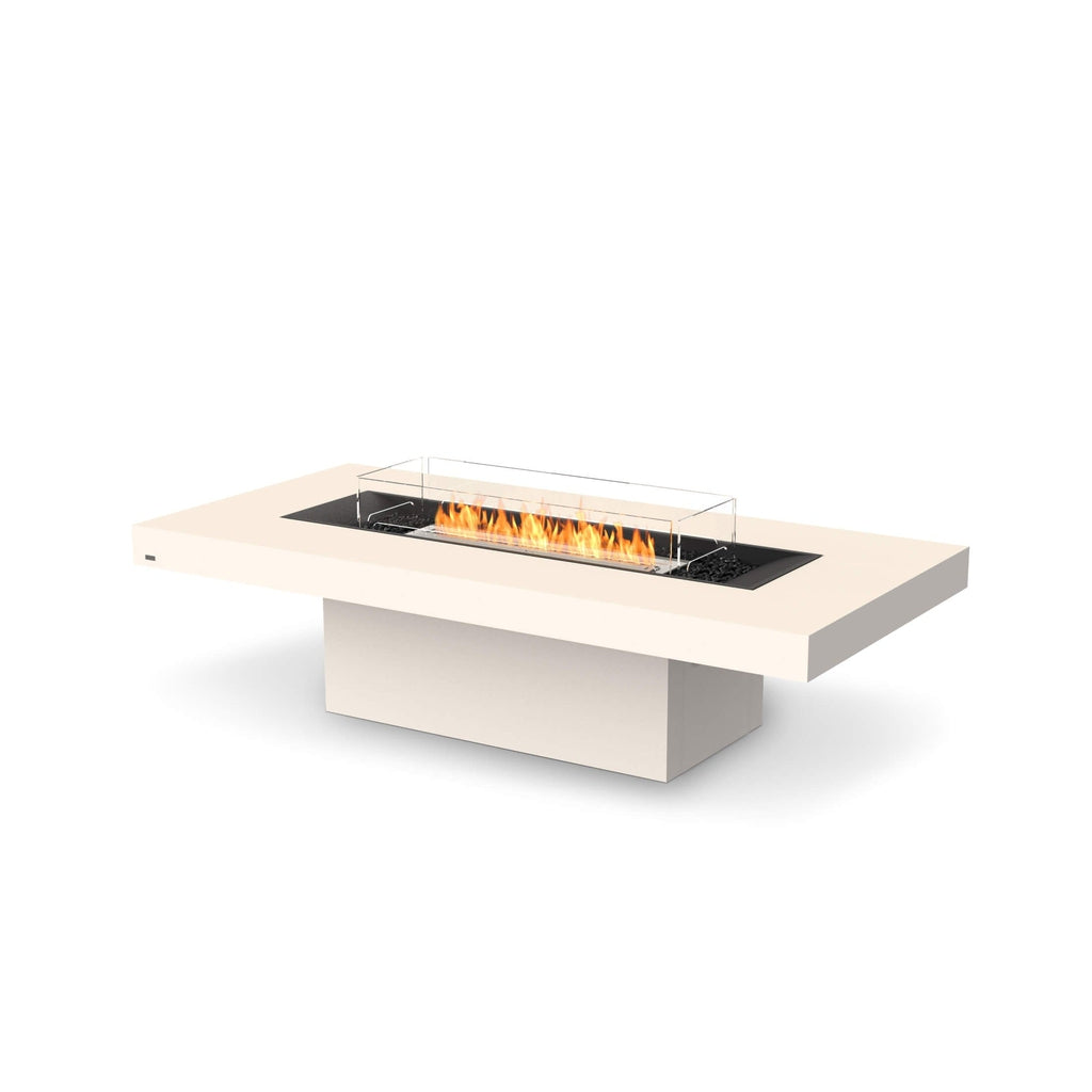 EcoSmart Fire Gin 90 bioethanol fire pit table in cream with a central burner, glass screen, and black decorative stones.