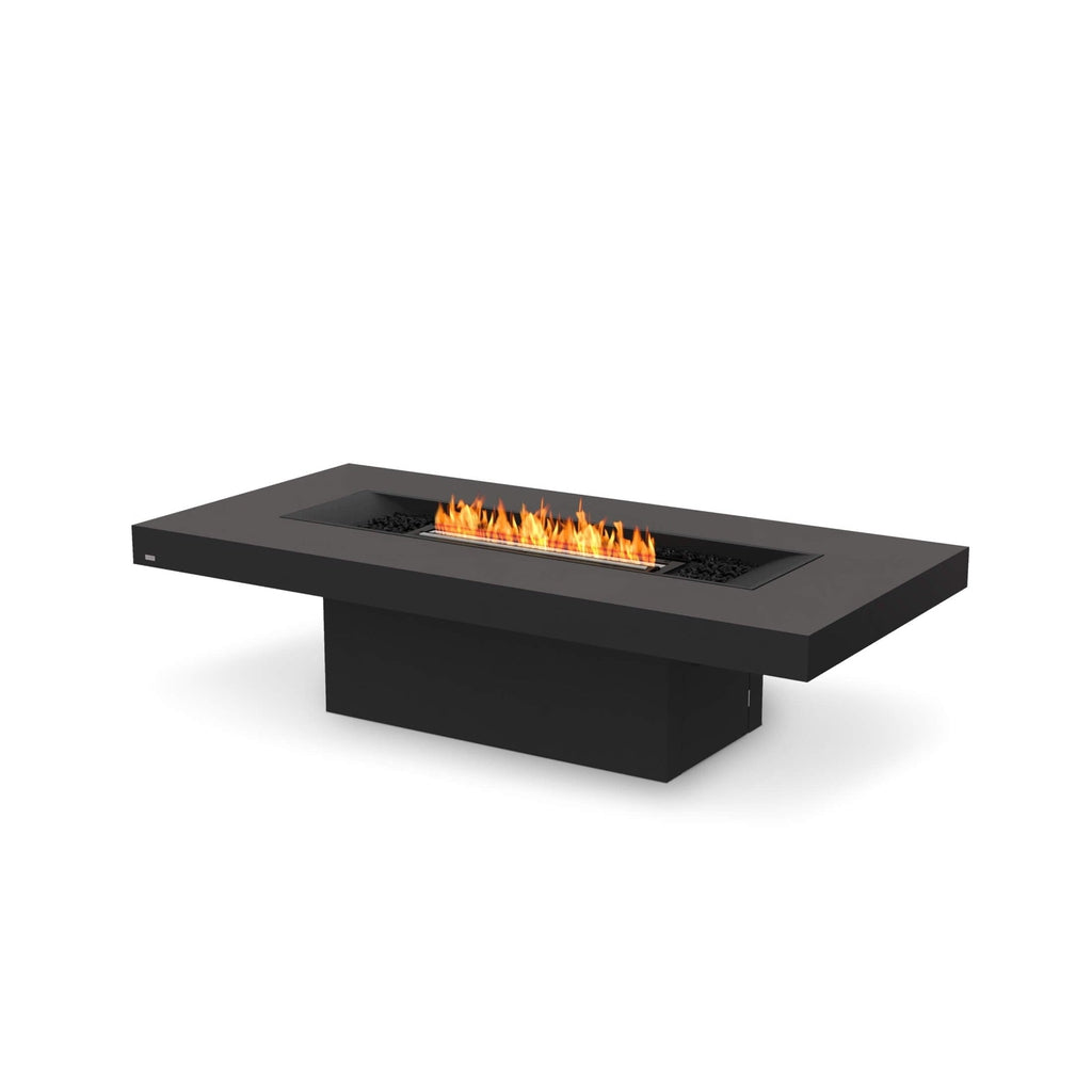 EcoSmart Fire Gin 90 bioethanol fire pit table in matte black with a central linear flame and black decorative stones.