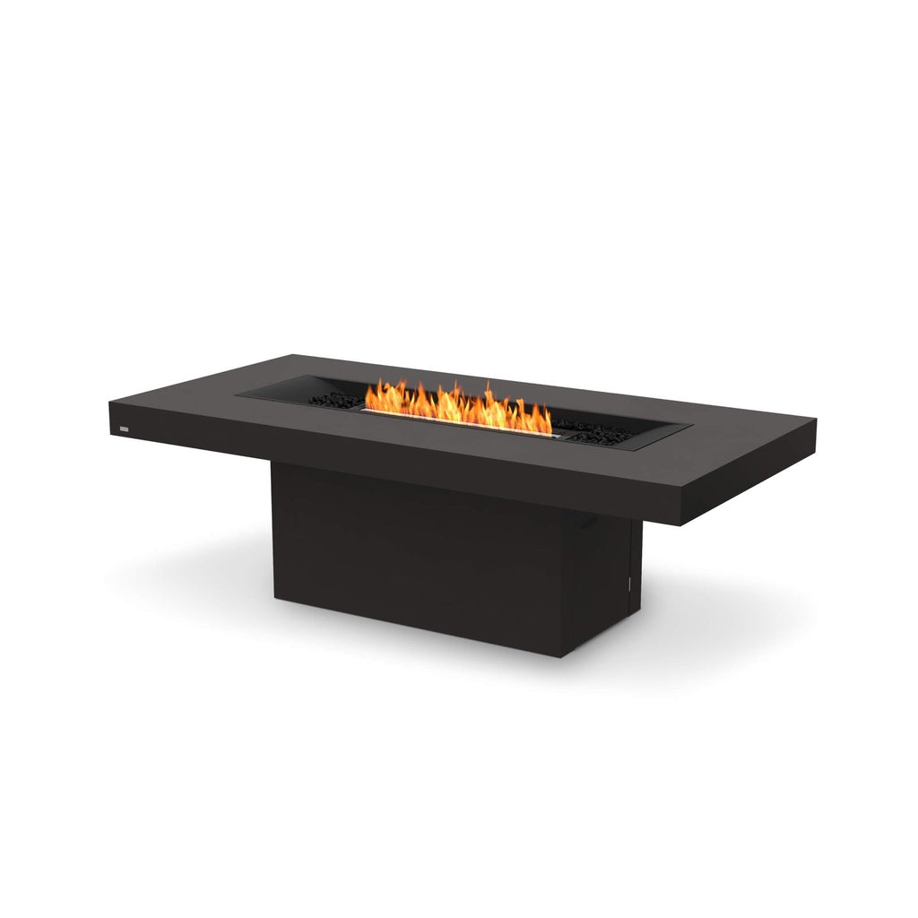 EcoSmart Fire Gin 90 dining fire pit table in black with a central linear flame and black decorative stones.