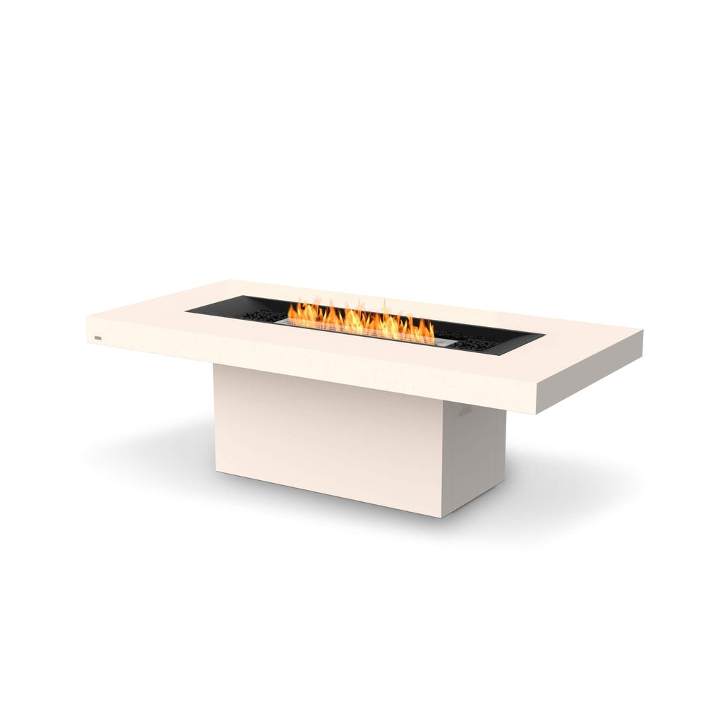 EcoSmart Fire Gin 90 dining fire pit table in cream with a central black burner and orange flames.