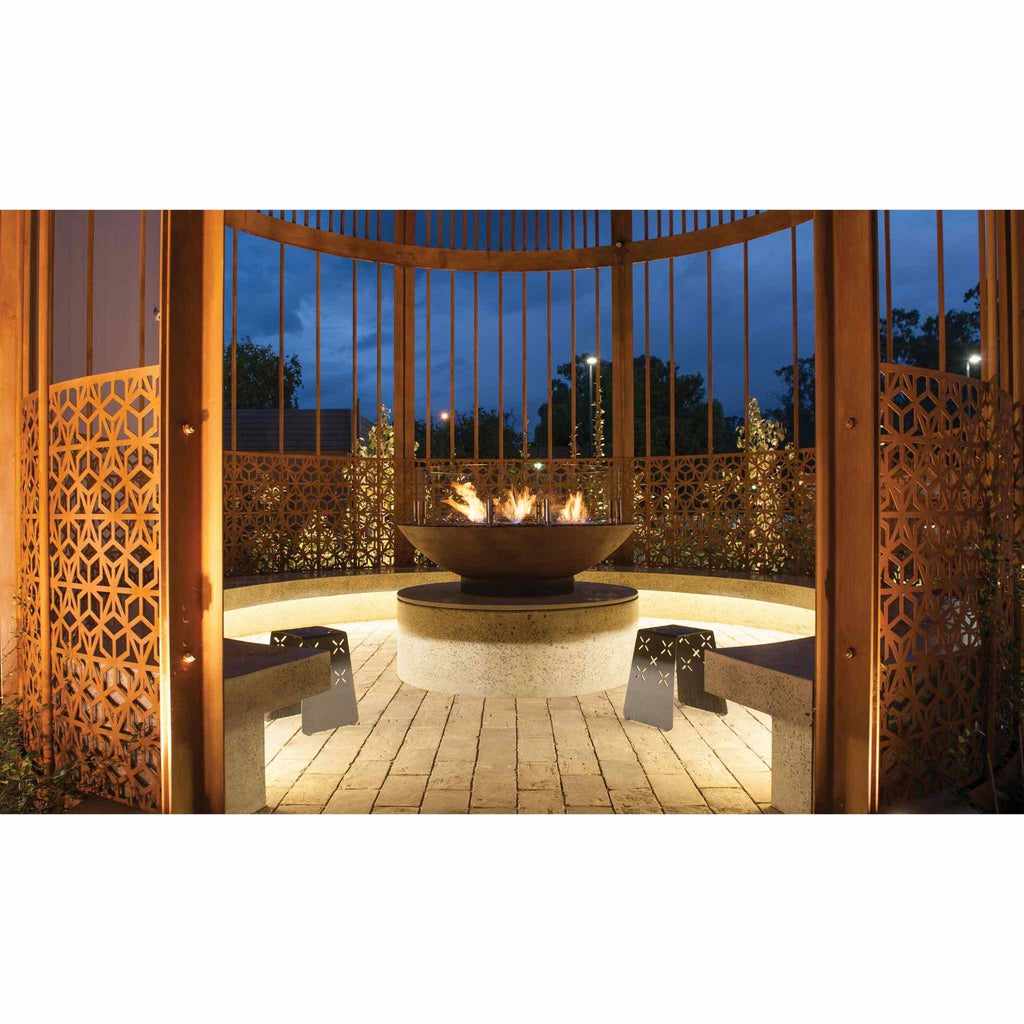 EcoSmart Fire XL500 ethanol burner in a black bowl set on a stone plinth inside a decorative outdoor gazebo.