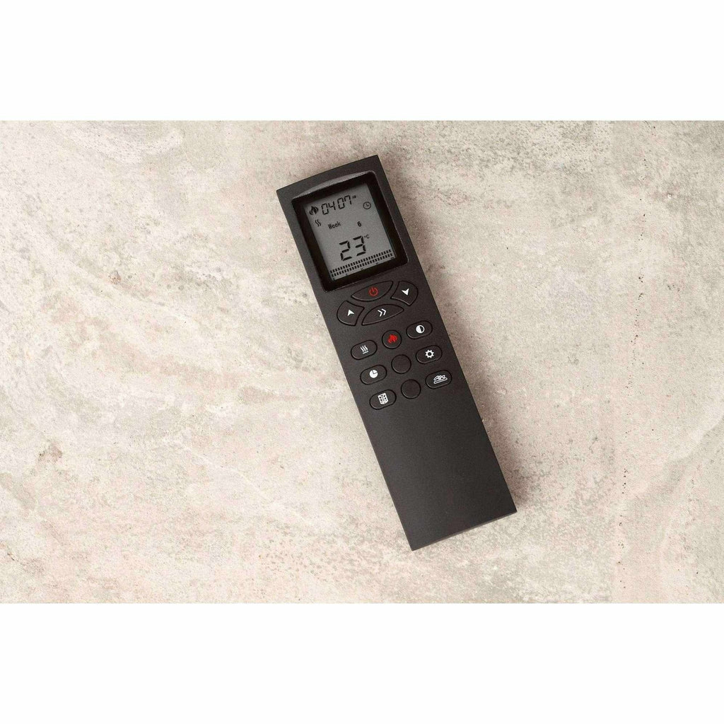 Black Flametek Juno Electric Fireplace Suite remote control with an LCD screen and button interface on a stone surface.