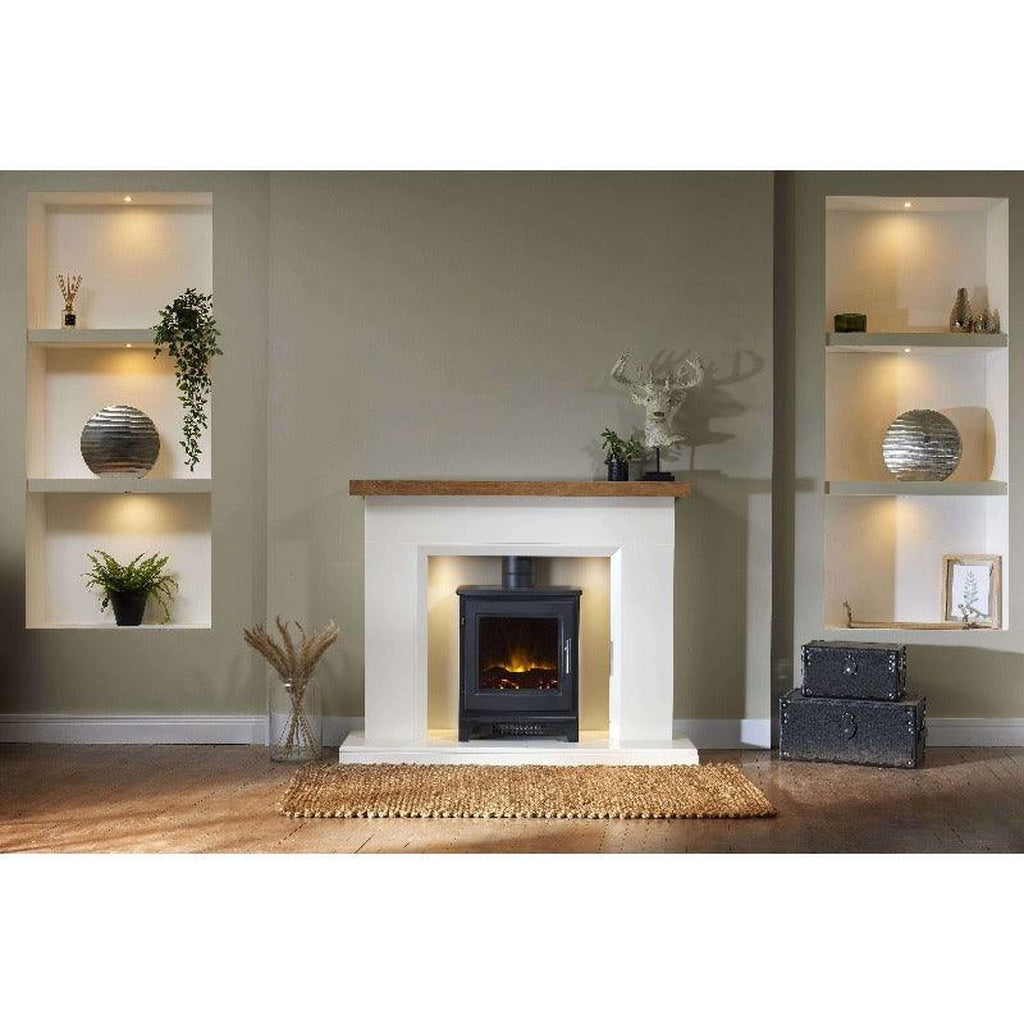Flametek Liberty Electric Stove Suite with a black stove, white surround, and wooden mantelpiece in a living room.