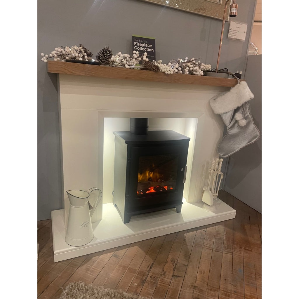 Flametek Liberty Electric Stove Suite with a black stove, white surround, and oak-effect mantel shelf.