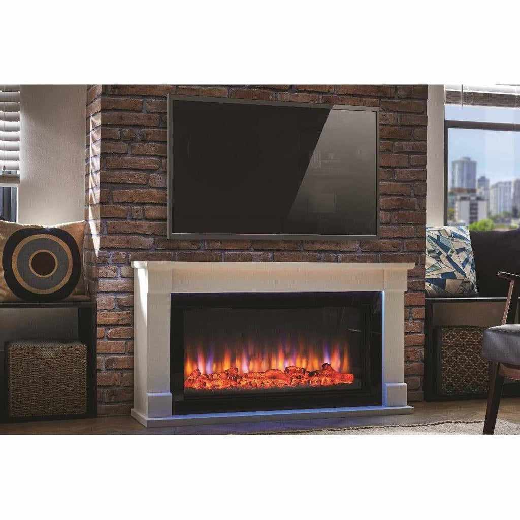 Suncrest Bradbury Ambience electric fireplace suite with a white surround against a rustic brick chimney breast.