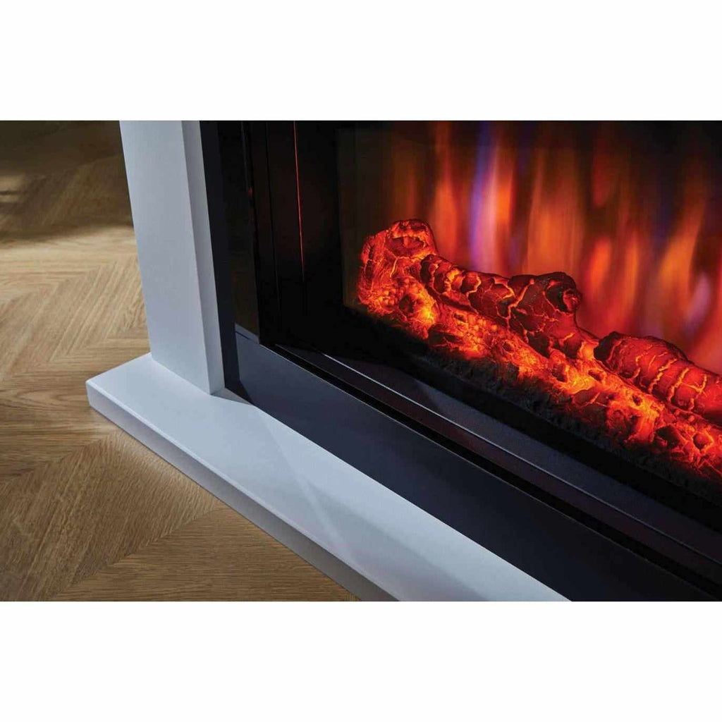 Suncrest Lumley Electric Fireplace Suite with a white surround and glowing log flame effect on a wooden floor.